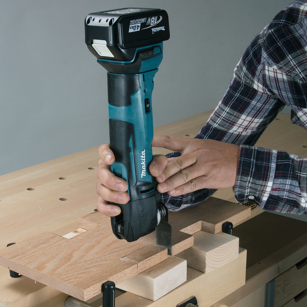Многофункциональный инструмент Makita DTM51Z 390Вт синий/черный — миниатюра 2