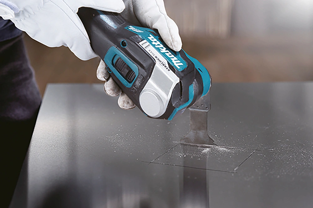 Многофункциональный инструмент Makita DTM52RTJX1 синий/черный — миниатюра 12